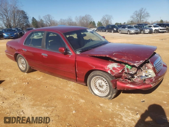 1998 Ford Crown Victoria LX с VIN 2FAFP74W3WX138757, выставлен на аукционе Copart как лот 87867945 с пробегом 148 827 миль миль и Списание • Salvage title. История ставок и продаж доступна на DreamBid. Изображение 4.