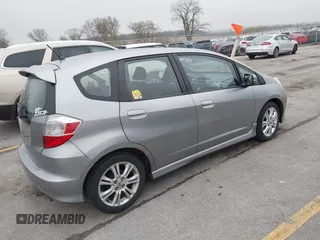 2009 Honda Fit Sport with VIN JHMGE88469S063030, listed as a IAAI auction lot 42064670 with 156,791 mi miles. Bid and sale history available at carsss.com. Image 4.