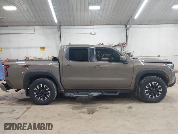 2024 Nissan Frontier SV with VIN 1N6ED1EK8RN613989, listed as a IAAI auction lot 42310148 with 14,202 mi miles and . Bid and sale history available at DreamBid. Image 13.