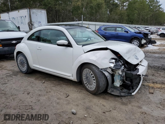 2014 Volkswagen Beetle 2.5L w/Sun with VIN 3VWJP7AT7EM613977, listed as a Copart auction lot 89251315 with 101,885 mi miles and Salvage Title. Bid and sale history available at DreamBid. Image 4.