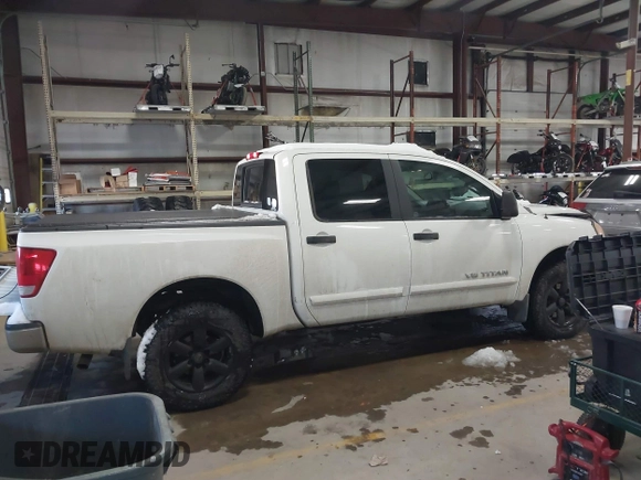 2014 Nissan Titan S with VIN 1N6AA0EC2EN512337, listed as a IAAI auction lot 41337837 with 187,540 mi miles and . Bid and sale history available at DreamBid. Image 13.