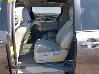 2013 Toyota Sienna XLE with VIN 5TDDK3DC0DS059036, listed as a IAAI auction lot 42069896 with 124,105 mi miles and . Bid and sale history available at DreamBid. Image 8.