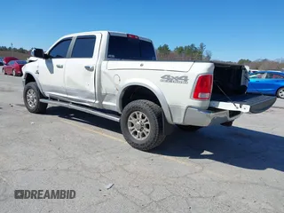 2018 Ram 2500 Laramie z VIN 3C6UR5FL4JG404249, wystawiony jako IAAI lot #41965199 z przebiegiem 123 506 mil mil oraz . Historia ofert i sprzedaży dostępna na DreamBid. Obrazek 3.