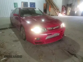 1997 Nissan Skyline z VIN BCNR33042682, wystawiony jako Copart lot #76562674 z przebiegiem 61 791 mil mil oraz Czysty tytuł • Clean title. Historia ofert i sprzedaży dostępna na DreamBid. Obrazek 10.