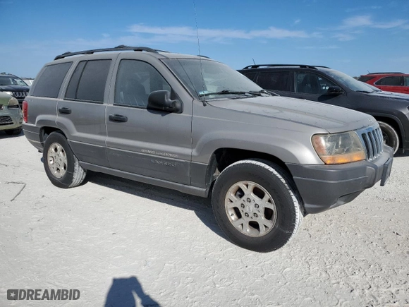 2001 Jeep Grand Cherokee Laredo with VIN 1J4GW48N01C682814, listed as a Copart auction lot 76239634 with 0 mi miles and Salvage Title. Bid and sale history available at carsss.com. Image 4.