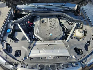 2021 BMW X4 M40i with VIN 5UX2V5C05M9F68427, listed as a Copart auction lot 64941095 with 50,208 mi miles and Salvage title. Bid and sale history available at DreamBid. Image 11.