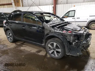 2015 Subaru Crosstrek Touring with VIN JF2GPBPCXFH217735, listed as a Copart auction lot 59769385 with 102,260 mi miles and Salvage title. Bid and sale history available at DreamBid. Image 4.