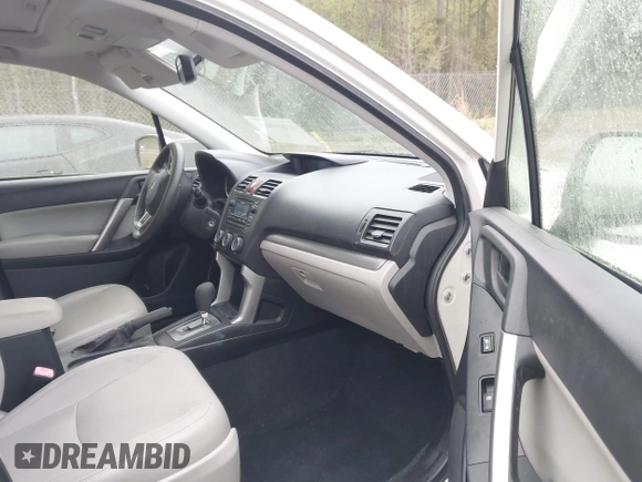 2014 Subaru Forester Premium z VIN JF2SJAEC7EH470132, wystawiony jako IAAI lot #41869866 z przebiegiem 63 625 mil mil oraz . Historia ofert i sprzedaży dostępna na DreamBid. Obrazek 5.