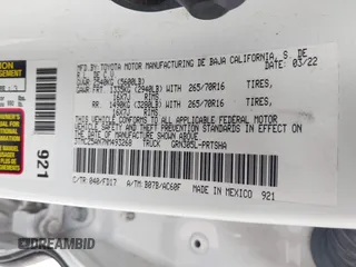 2022 Toyota Tacoma SR z VIN 3TMCZ5AN7NM493268, wystawiony jako IAAI lot #42041593 z przebiegiem 100 589 mil mil oraz . Historia ofert i sprzedaży dostępna na DreamBid. Obrazek 9.