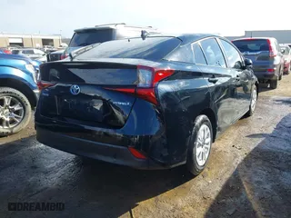2020 Toyota Prius L Eco with VIN JTDKARFU7L3119834, listed as a IAAI auction lot 41653177 with 140,964 mi miles. Bid and sale history available at carsss.com. Image 4.