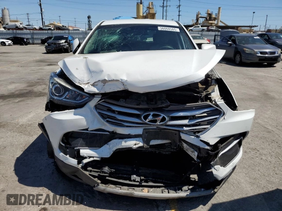 2018 Hyundai Santa Fe 2.4L with VIN 5NMZT3LB3JH095801, listed as a Copart auction lot 56068565 with 82,616 mi miles and Salvage title. Bid and sale history available at DreamBid. Image 5.
