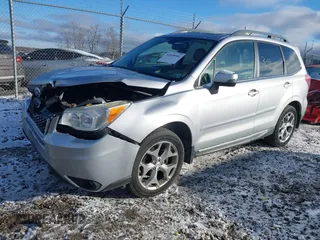 2016 Subaru Forester Touring z VIN JF2SJAXC4GH536085, wystawiony jako IAAI lot #41838081 z przebiegiem 155 930 mil mil oraz . Historia ofert i sprzedaży dostępna na DreamBid. Obrazek 2.