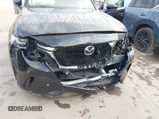 2025 Mazda CX-90 Preferred with VIN JM3KKBHD7S1208001, listed as a IAAI auction lot 42503425 with 16,745 mi miles and . Bid and sale history available at DreamBid. Image 6.
