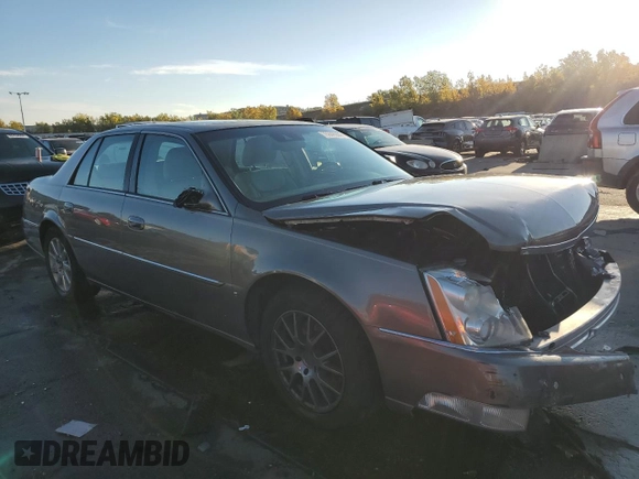 2010 Cadillac DTS 1SD z VIN 1G6KH5EY8AU108702, wystawiony jako Copart lot #76286984 z przebiegiem 177 455 mil mil oraz Szkoda całkowita • Salvage title. Historia ofert i sprzedaży dostępna na DreamBid. Obrazek 4.