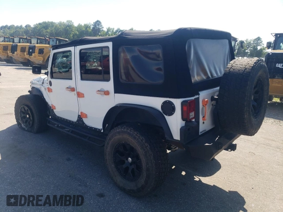 2014 Jeep Wrangler Unlimited Rubicon with VIN 1C4BJWFG4EL325544, listed as a Copart auction lot 61966025 with 149,162 mi miles and Salvage title. Bid and sale history available at DreamBid. Image 2.