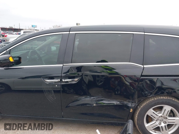 2013 Honda Odyssey Touring with VIN 5FNRL5H9XDB073706, listed as a IAAI auction lot 41591111 with 158,305 mi miles and . Bid and sale history available at carsss.com. Image 14.
