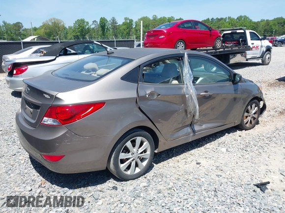 2014 Hyundai Accent GLS with VIN KMHCU4AE7EU736691, listed as a IAAI auction lot 42054514 with 80,715 mi miles and . Bid and sale history available at carsss.com. Image 4.