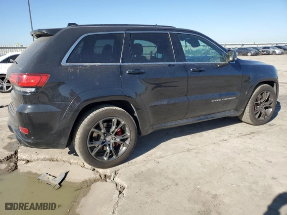2015 Jeep Grand Cherokee SRT with VIN 1C4RJFDJ7FC613234, listed as a Copart auction lot 47537205 with 125,275 mi miles and Clean Title. Bid and sale history available at carsss.com. Image 3.