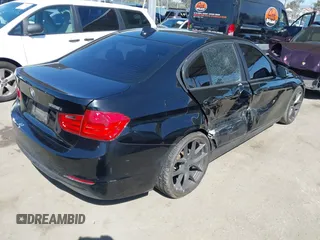 2014 BMW 3 Series 328i with VIN WBA3C1C59EK108093, listed as a IAAI auction lot 41965358 with 113,351 mi miles. Bid and sale history available at carsss.com. Image 4.