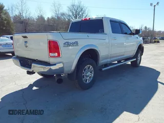 2018 Ram 2500 Laramie z VIN 3C6UR5FL4JG404249, wystawiony jako IAAI lot #41965199 z przebiegiem 123 506 mil mil oraz . Historia ofert i sprzedaży dostępna na DreamBid. Obrazek 4.