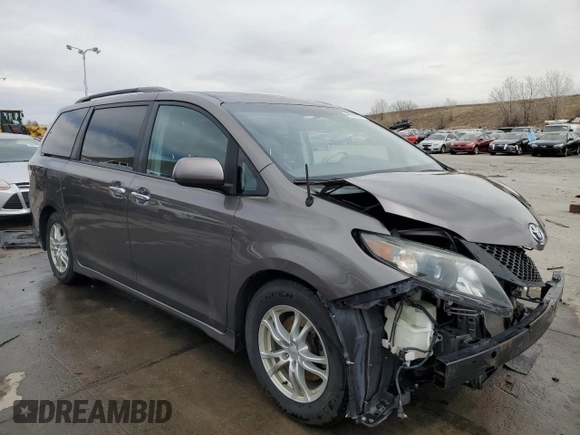2014 Toyota Sienna SE with VIN 5TDXK3DC1ES445110, listed as a Copart auction lot 49928895 with 127,087 mi miles and Salvage Title. Bid and sale history available at DreamBid. Image 4.