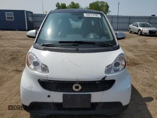 2014 Smart fortwo Pure z VIN WMEEJ3BA5EK779399, wystawiony jako Copart lot #59279785 z przebiegiem 117 204 mil mil oraz Tytuł czysty. Historia ofert i sprzedaży dostępna na DreamBid. Obrazek 5.