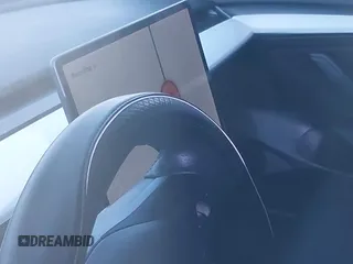 2022 Tesla Model 3 Performance z VIN 5YJ3E1EC7NF137744, wystawiony jako IAAI lot #41427701 z przebiegiem Nie podano mil oraz . Historia ofert i sprzedaży dostępna na DreamBid. Obrazek 14.