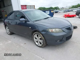 2009 Mazda Mazda3 i Touring Value with VIN JM1BK32F691204055, listed as a IAAI auction lot 42152273 with 252,960 mi miles. Bid and sale history available at carsss.com. Image 1.