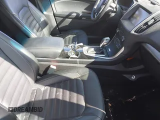 2015 Ford Edge SEL with VIN 2FMTK3J99FBB21084, listed as a IAAI auction lot 41867221 with 83,012 mi miles. Bid and sale history available at carsss.com. Image 5.