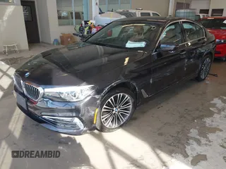 2018 BMW 5 Series 530i xDrive with VIN WBAJA7C55JWA73459, listed as a IAAI auction lot 41634921 with 64,759 mi miles and . Bid and sale history available at carsss.com. Image 2.