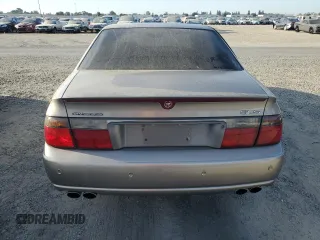 2002 Cadillac Seville Luxury SLS z VIN 1G6KS54Y22U149573, wystawiony jako Copart lot #71468564 z przebiegiem 158 498 mil mil oraz Czysty tytuł • Clean title. Historia ofert i sprzedaży dostępna na DreamBid. Obrazek 6.