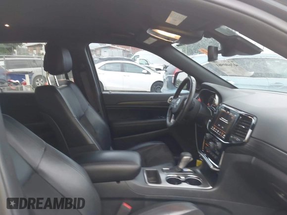 2020 Jeep Grand Cherokee Laredo E with VIN 1C4RJEAG7LC324904, listed as a IAAI auction lot 42600961 with 93,444 mi miles and . Bid and sale history available at DreamBid. Image 5.