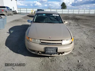2000 Saturn LS z VIN 1G8JU52F0YY638148, wystawiony jako Copart lot #44614584 z przebiegiem 104 794 mil mil oraz Tytuł czysty. Historia ofert i sprzedaży dostępna na DreamBid. Obrazek 5.