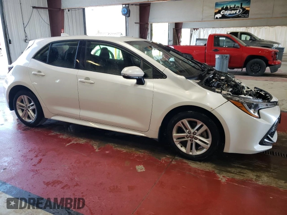 2022 Toyota Corolla Hatchback SE with VIN JTND4MBE4N3182793, listed as a Copart auction lot 69609184 with 21,813 mi miles and Salvage Title. Bid and sale history available at carsss.com. Image 4.