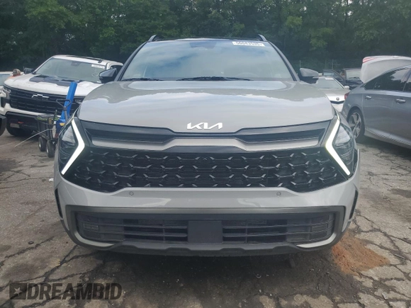 2023 Kia Sportage X-Pro z VIN 5XYK7CAFXPG094501, wystawiony jako Copart lot #56043535 z przebiegiem 19 241 mil mil oraz Szkoda całkowita • Salvage title. Historia ofert i sprzedaży dostępna na DreamBid. Obrazek 5.