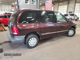 1996 Plymouth Voyager z VIN 2P4FP2530TR585740, wystawiony jako Copart lot #57253044 z przebiegiem Nie podano mil oraz Szkoda całkowita • Salvage title. Historia ofert i sprzedaży dostępna na DreamBid. Obrazek 3.