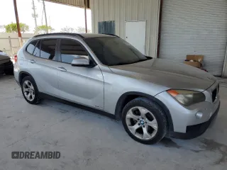 2014 BMW X1 sDrive28i z VIN WBAVM1C57EVW50653, wystawiony jako Copart lot #57309385 z przebiegiem Nie podano mil oraz Szkoda całkowita • Salvage title. Historia ofert i sprzedaży dostępna na DreamBid. Obrazek 4.