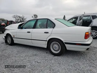 1995 BMW 5 Series 525i z VIN WBAHD6326SGK83552, wystawiony jako Copart lot #45245825 z przebiegiem 181 607 mil mil oraz Szkoda całkowita • Salvage title. Historia ofert i sprzedaży dostępna na DreamBid. Obrazek 2.