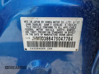 2007 Honda Fit Sport with VIN JHMGD38647S047784, listed as a Copart auction lot 68098994 with 0 mi miles and Salvage Title. Bid and sale history available at carsss.com. Image 13.