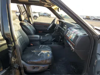 1998 Jeep Grand Cherokee Limited with VIN 1J4GZ78Y9WC322919, listed as a Copart auction lot 73225994 with 171,474 mi miles and Salvage Title. Bid and sale history available at carsss.com. Image 7.