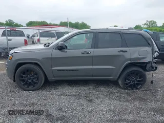 2021 Jeep Grand Cherokee Laredo E with VIN 1C4RJFAG1MC655503, listed as a IAAI auction lot 42387765 with 38,423 mi miles and . Bid and sale history available at DreamBid. Image 14.
