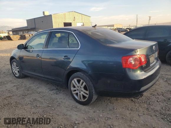 2007 Volkswagen Jetta z VIN 3VWDG71K27M010409, wystawiony jako Copart lot #84155424 z przebiegiem 140 665 mil mil oraz Czysty tytuł • Clean title. Historia ofert i sprzedaży dostępna na DreamBid. Obrazek 2.