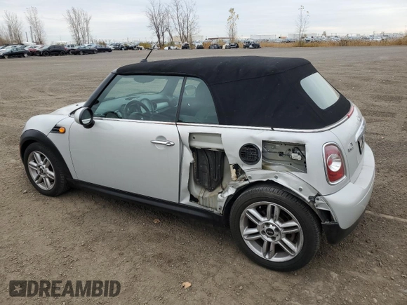 2012 MINI Convertible with VIN WMWZN3C57CT135185, listed as a Copart auction lot 78580644 with 83,027 mi miles and Salvage Title. Bid and sale history available at DreamBid. Image 2.