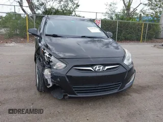 2013 Hyundai Accent SE with VIN KMHCU5AE8DU109616, listed as a IAAI auction lot 42051364 with 96,739 mi miles. Bid and sale history available at carsss.com. Image 6.