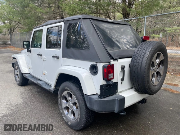 2016 Jeep Wrangler Unlimited 75th Anniversary with VIN 1C4BJWEG5GL215915, listed as a Copart auction lot 52680895 with 143,836 mi miles and Clean title. Bid and sale history available at DreamBid. Image 3.