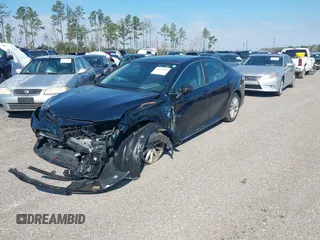 2020 Toyota Camry LE with VIN 4T1C11AK9LU985116, listed as a IAAI auction lot 40798999 with 53,390 mi miles. Bid and sale history available at carsss.com. Image 2.