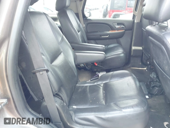 2013 Chevrolet Tahoe LTZ with VIN 1GNSKCE0XDR373858, listed as a IAAI auction lot 42456875 with 297,084 mi miles and . Bid and sale history available at DreamBid. Image 8.