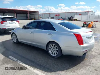 2015 Cadillac CTS RWD with VIN 1G6AP5SX5F0115745, listed as a IAAI auction lot 41658935 with 62,477 mi miles and . Bid and sale history available at DreamBid. Image 3.