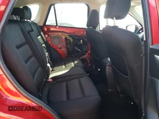 2014 Mazda CX-5 Touring with VIN JM3KE2CY9E0356050, listed as a Copart auction lot 65470674 with 70,400 mi miles and Salvage Title. Bid and sale history available at DreamBid. Image 11.