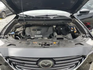 2016 Mazda CX-9 Grand Touring z VIN JM3TCADY7G0122768, wystawiony jako Copart lot #65624615 z przebiegiem 82 388 mil mil oraz Czysty tytuł • Clean title. Historia ofert i sprzedaży dostępna na DreamBid. Obrazek 12.
